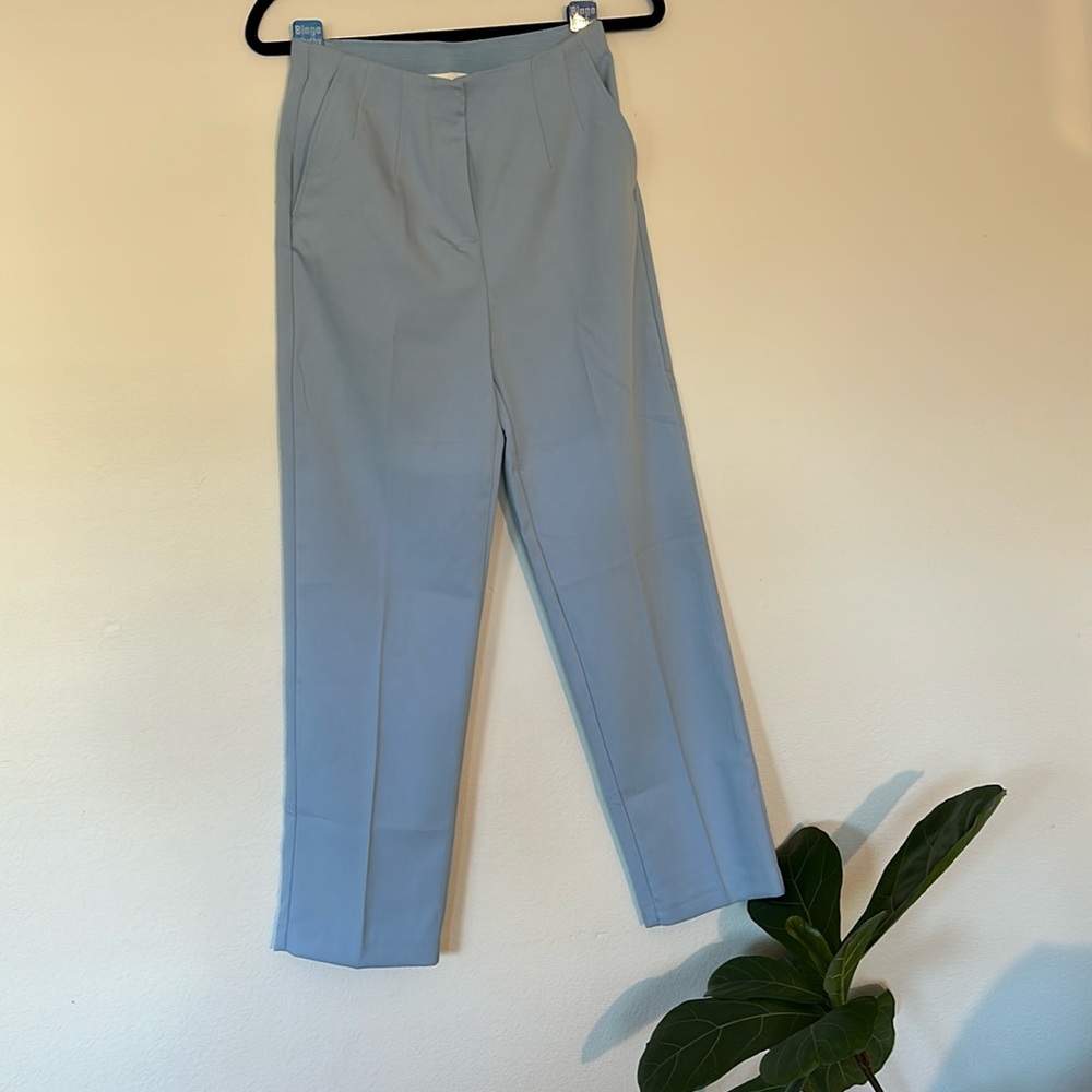 Used only once. Dress pants, baby blue. Very comfortable.
